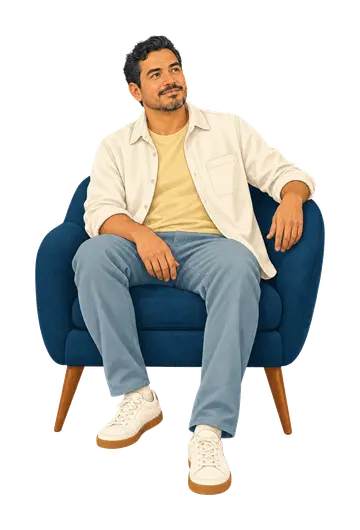 An adult seated thoughtfully in a calm private space