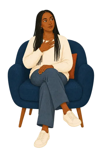 A young adult woman seated with one hand over her heart in a grounded reflective moment